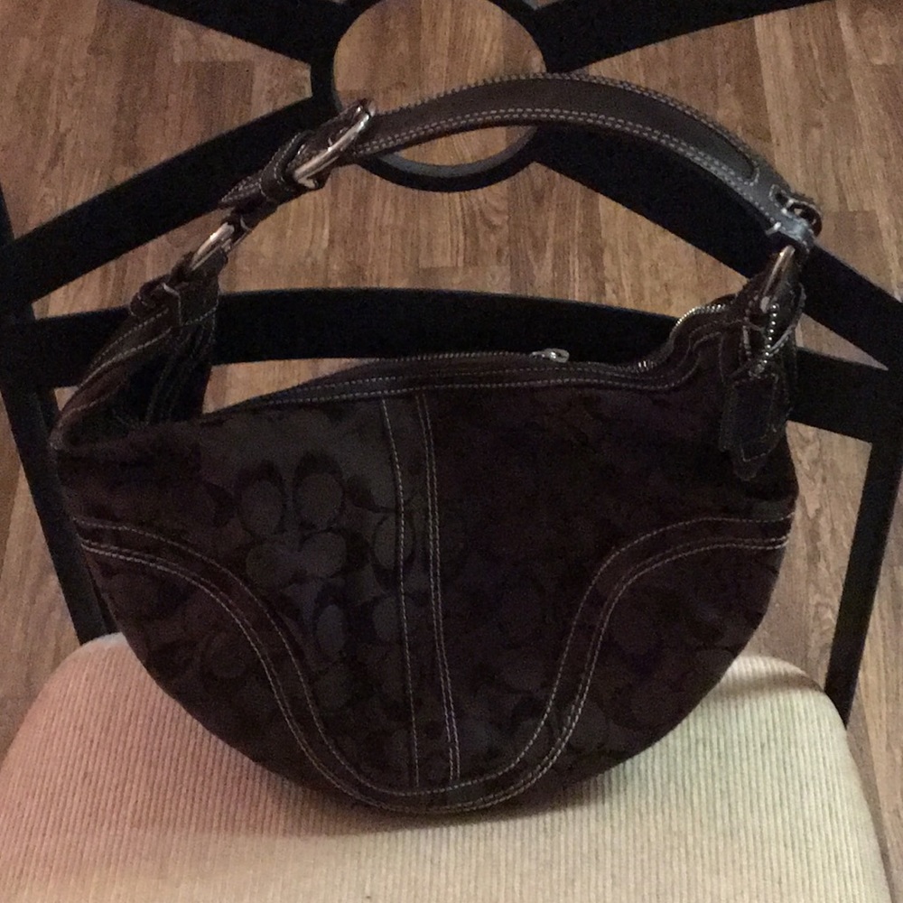 A chocolate Coach purse